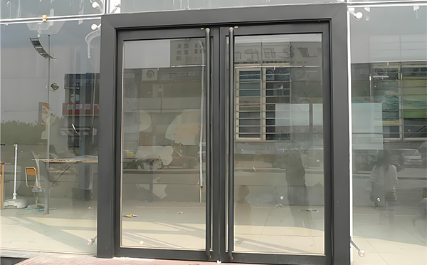 囊谦玻璃地弹门